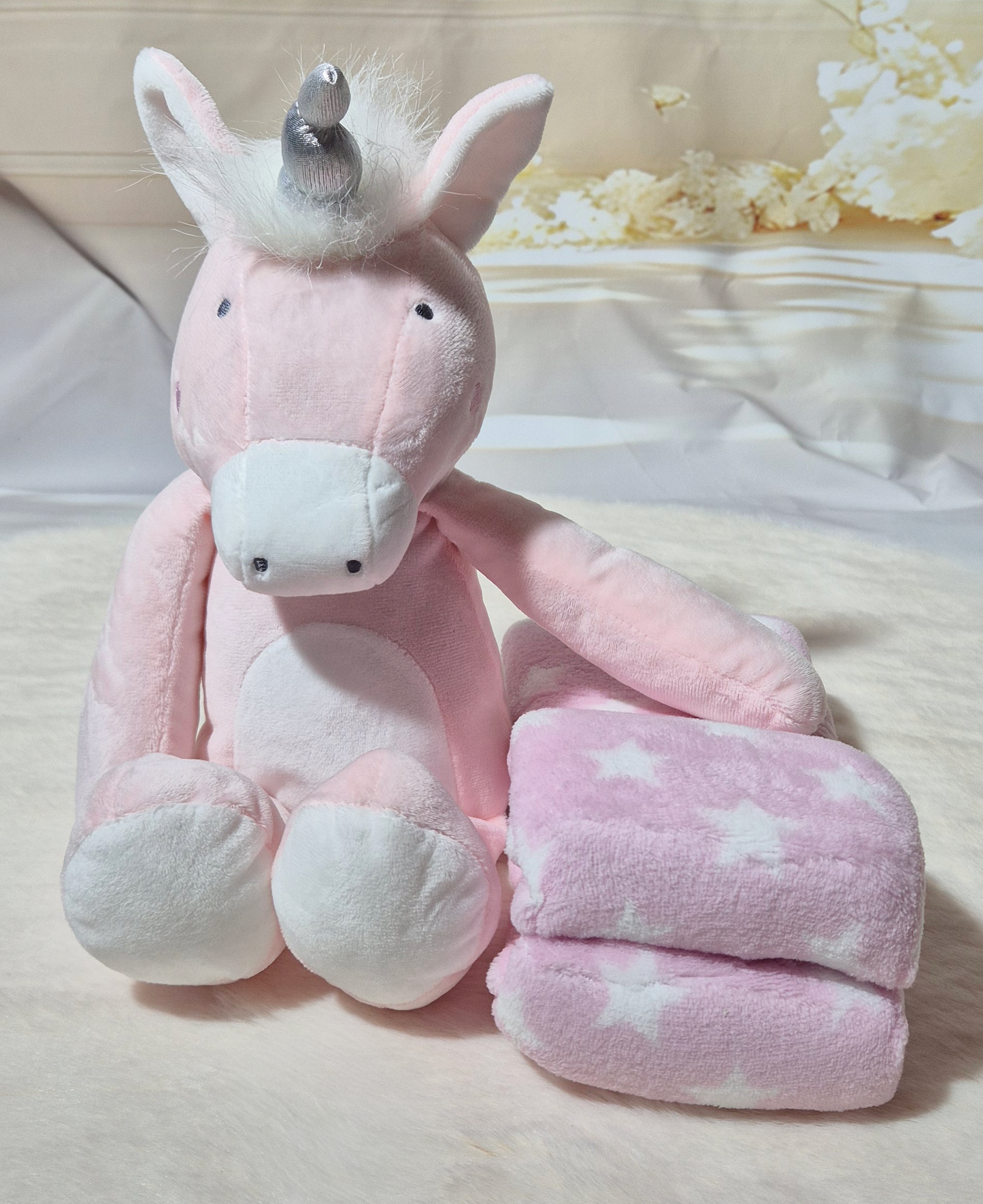 Peluche licorne rose avec couverture Au palais des rêves