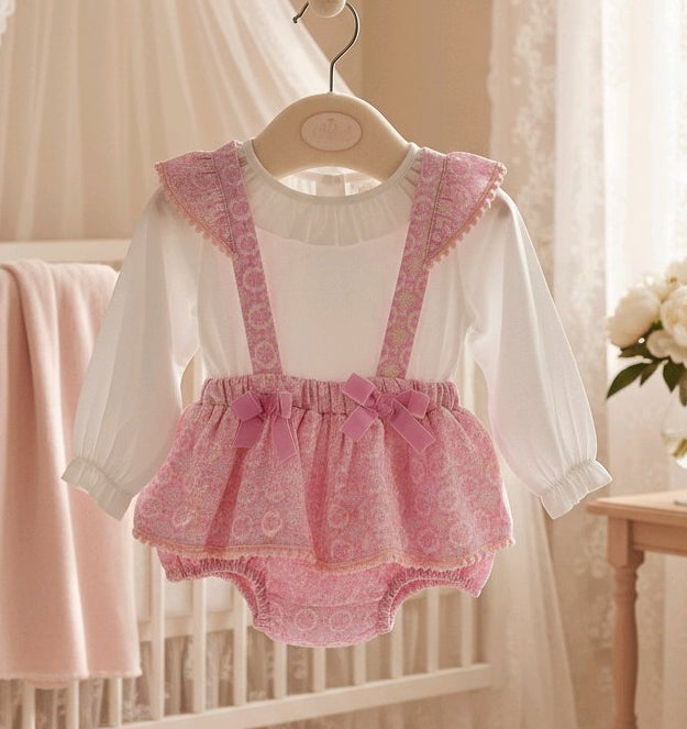 Barboteuse bébé fille à bretelles fleuries et nœuds roses