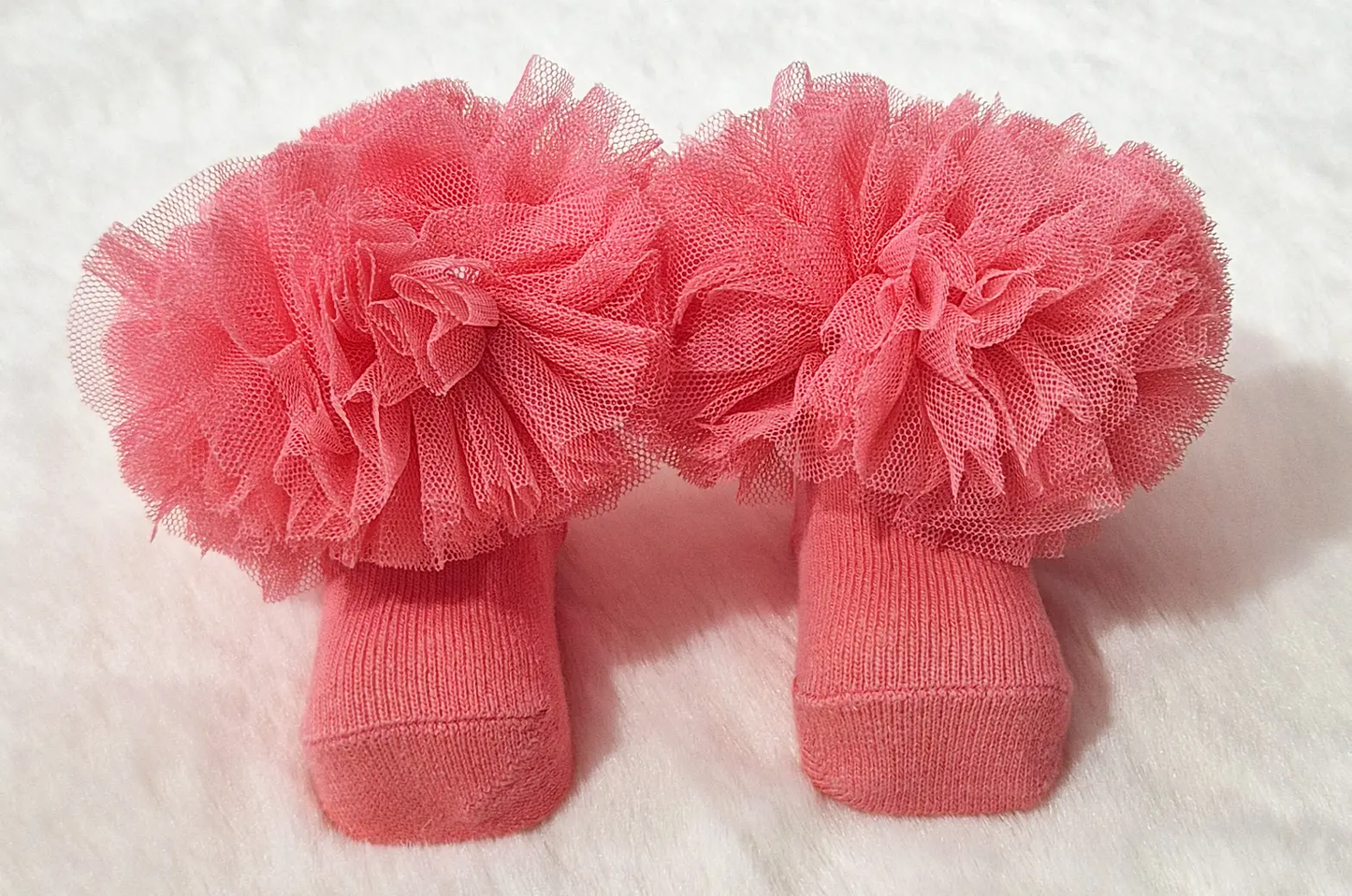 Chausson rose corail avec ponpon Au palais des rêves