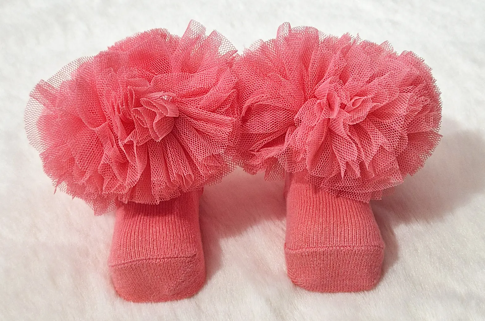 Chausson rose corail avec ponpon Au palais des rêves