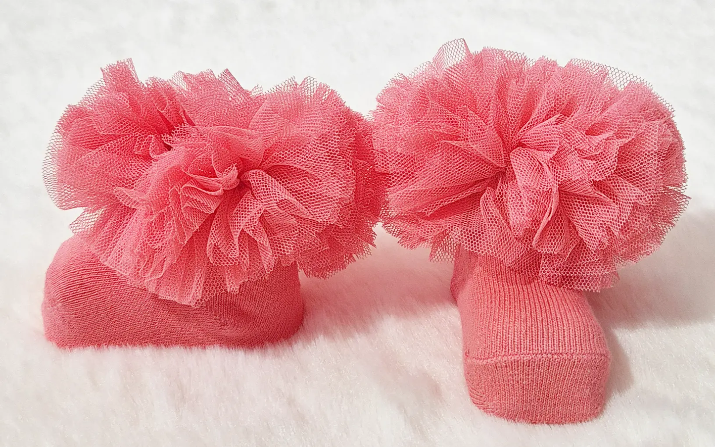 Chausson rose corail avec ponpon Au palais des rêves