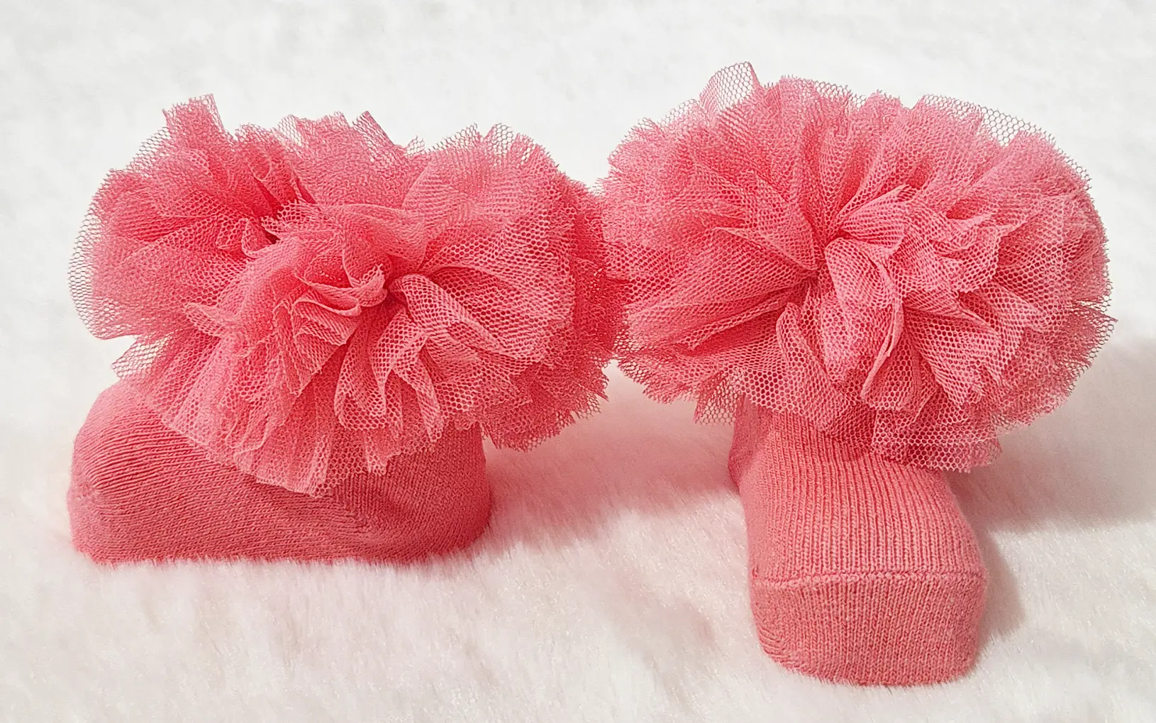 Chausson rose corail avec ponpon Au palais des rêves