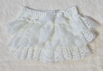 Ensemble bébé fille “Douce Dentelle Ivoire” – 3 pièces avec volants et nœuds Au palais des rêves